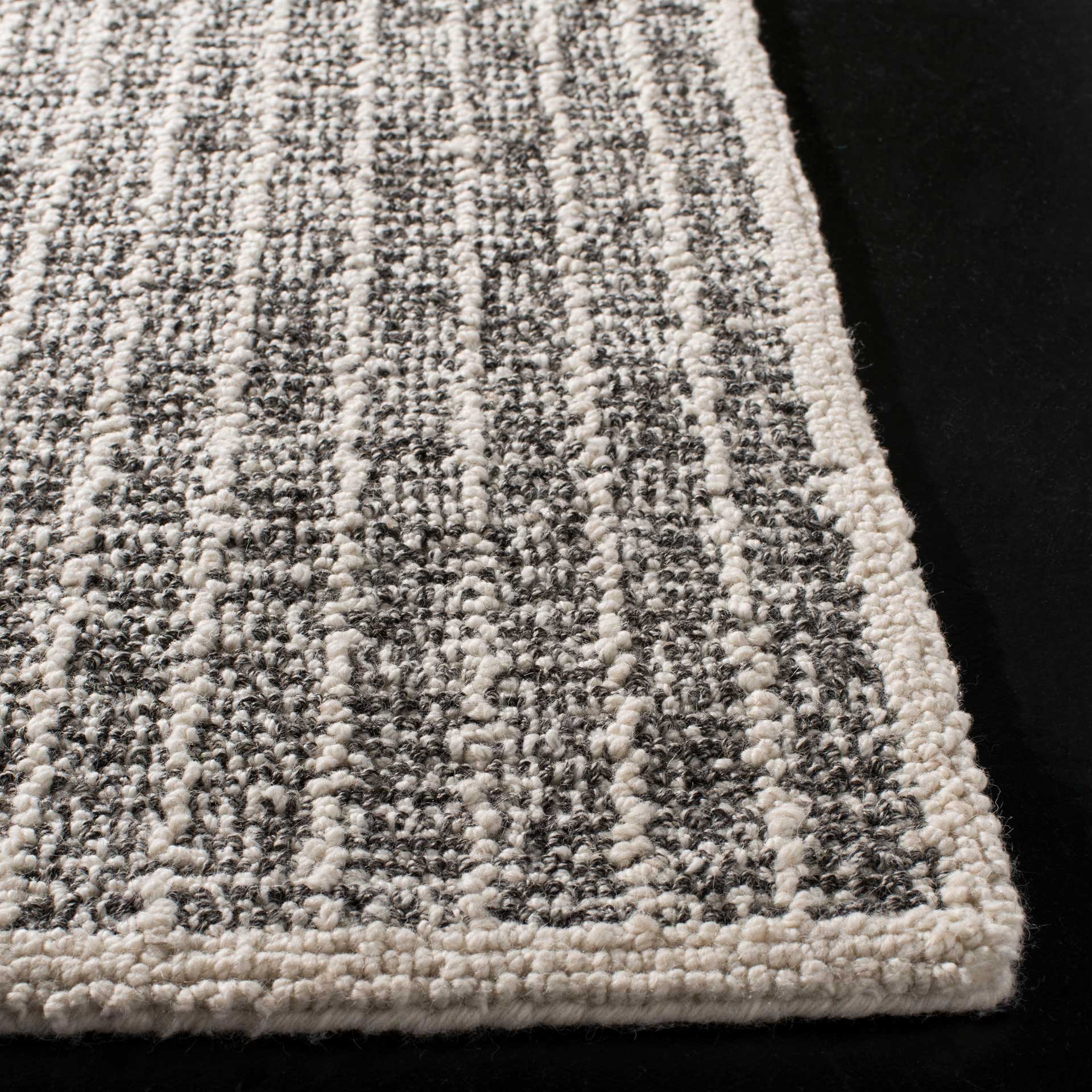 Abstract Ivory/Black Area Rug - Image 2