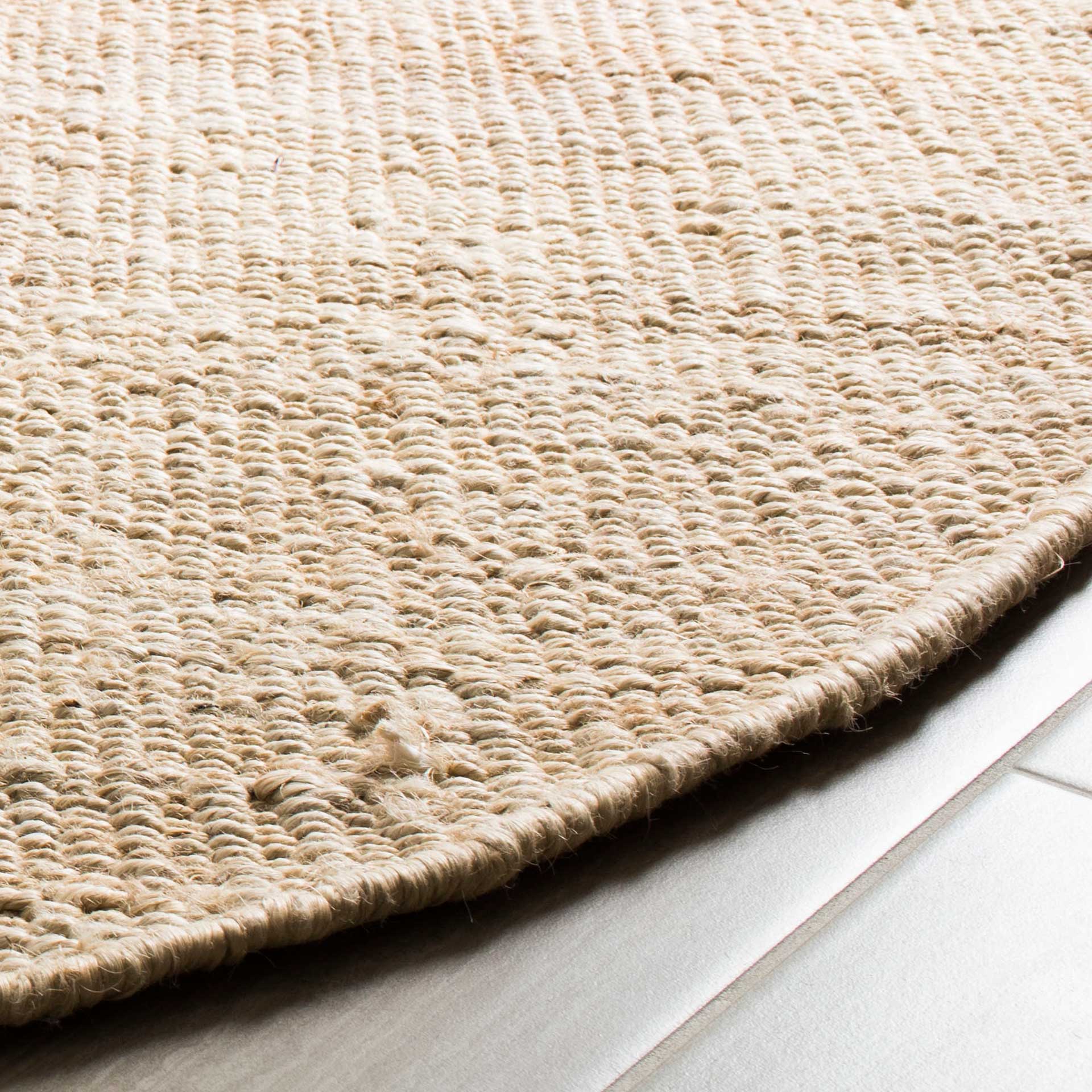 Natural Fiber Solid Ivory Round Rug - Image 2